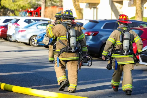 Briaroaks firefighters in full turnout gear and SCBA respond to a scene